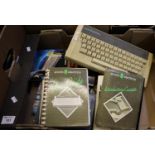 An Acorn Electron computer, together with various cassette games, books/manuals etc. (B.P. 24% incl.