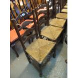 Late 19th/early 20th Century ash and elm ladder back Lancashire style dining chairs on rush