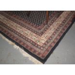 Large Indian hand knotted woollen carpet, 100% wool pile, on a multi-coloured ground with geometeric