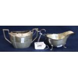 Silver sauceboat with card cut edge and scrolled handle on paw feet. Chester hallmarks, 2.85 troy