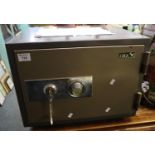 Cock steel floor safe with combination and key lock. 48 x 40 x 38cm approx. (B.P. 21% + VAT)