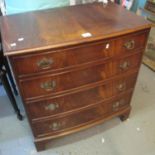 Reprodux mahogany bow front chest of four drawers on bracket feet. (B.P. 21% + VAT)