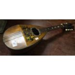 Vintage Italian wooden inlaid mandolin, the label to the interior 'Pietro Tonelli, Napoli'. (B.P.