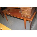 1970's teak coffee table on square tapering legs. (B.P. 21% + VAT)