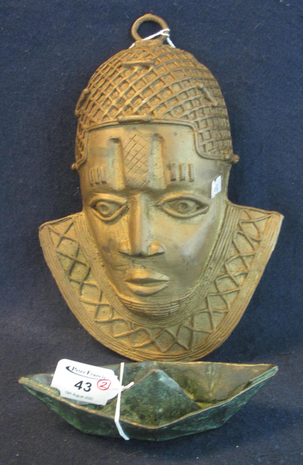 African hollow cast yellow metal possibly bronze head or wall mask, in the form of a woman's head in