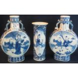 Pair of 19th Century Chinese blue and white porcelain moon flasks decorated with children and