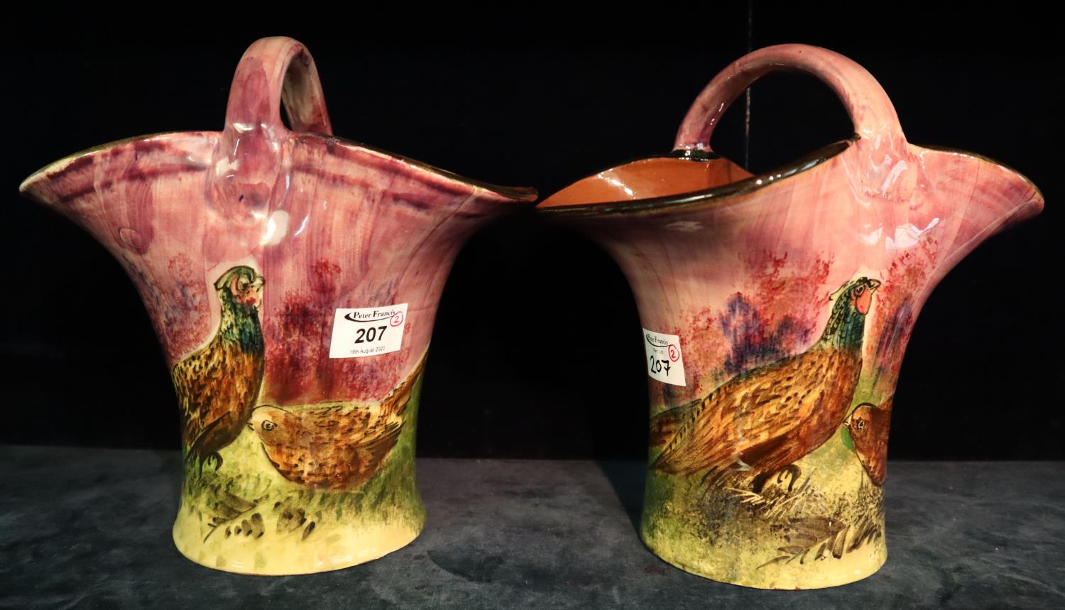 Pair of Torquay pottery Lemon and Crute single handled baskets decorated with pheasants. (2) (B.P.