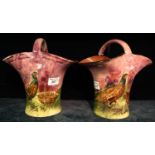 Pair of Torquay pottery Lemon and Crute single handled baskets decorated with pheasants. (2) (B.P.