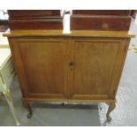 Early 20th Century oak two door blind panelled cupboard or sideboard on cabriole legs. (B.P. 21% +