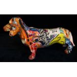 Modern model study of a graffiti dachshund by Lesser Pavey Ltd in original box. (B.P. 21% + VAT)