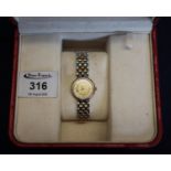 Omega Deville ladies bi-coloured yellow metal and steel quartz bracelet wristwatch, the gilt face