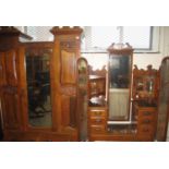 Edwardian carved mahogany two piece bedroom suite comprising; mirrored wardrobe and triple mirror