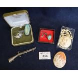 Collection of silver and costume jewellery items including: a Ruskin brooch and a Victorian silver