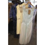 Three vintage dresses to include; a 60's empire line Chinese silk fabric dress with matching bolero,