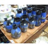 Tray of Torquay pottery Lemon and Crute vases of varying forms decorated with ships at night. (B.