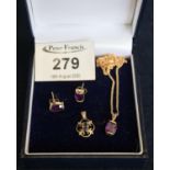 A 9ct gold amethyst pendant and earring set. (B.P. 21% + VAT)