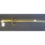Late 19th Century French pattern sword bayonet, single edged fullered blade with brass grip, lacking