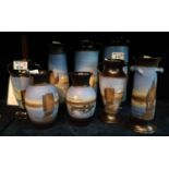 Collection of eight Torquay pottery Lemon and Crute vases of varying forms, overall decorated with