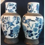 Pair of late 19th Century Chinese Quing design porcelain baluster shaped vases with cylinder