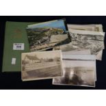 Box of assorted postcards and a small empty postcard album. (B.P. 21% + VAT)