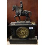 Black slate and marble two train mantel clock with equestrian mount. 51cm high approx. (B.P. 21% +