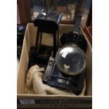 Vintage black japanned railway hand lantern with interchangable coloured lenses, together with