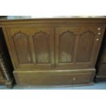 19th Century Welsh oak two door blind panelled press cupboard having ogee pointed and fielded panels