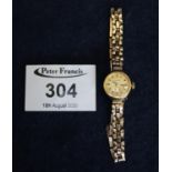 Everite ladies 9ct gold small head wristwatch with 9ct gold chain bracelet. 11.5g approx total. (B.