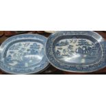 Three 19th Century blue and white transfer printed willow oval meat dishes. (B.P. 21% + VAT)