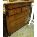 Victorian oak straight front chest of two short and three long drawers with carved, moulded corbels.