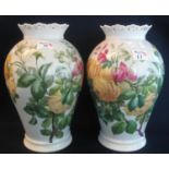 Pair of late 19th/early 20th Century porcelain baluster vases, hand painted with roses and