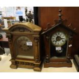 Early 20th Century oak architectural two train mantel clock, together with another probably American