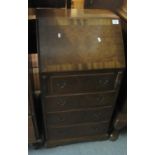Reproduction walnut fall front bureau with an arrangement of four drawers, of narrow proportions. (