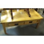 Modern pale oak two drawer coffee table on square supports. (B.P. 21% + VAT)