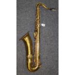 Vintage brass saxophone with appearing original carrying case. (B.P. 21% + VAT)