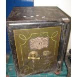 J Cartwright & Son West Bromich cast iron safe with key. (B.P. 21% + VAT)