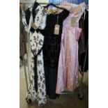 Three vintage (40's-60's) evening dresses to include; a black and white floral tulle and flock