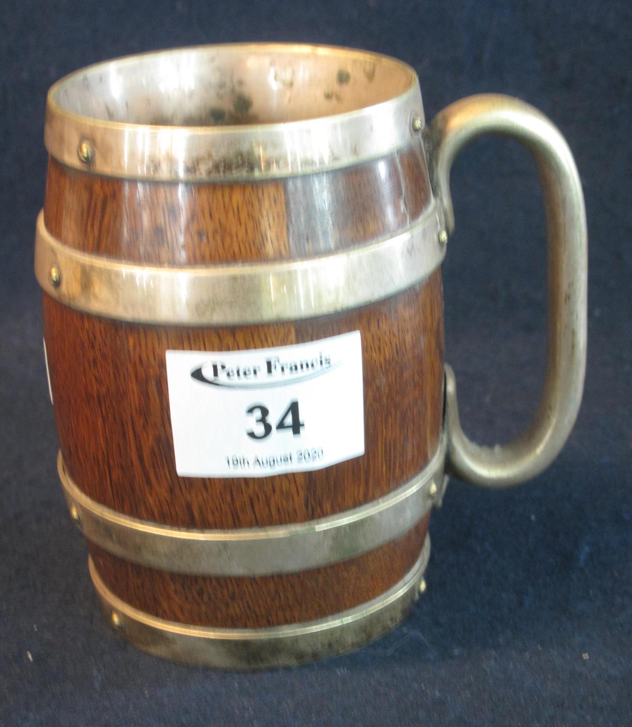 Early 20th Century oak coopered barrel shaped mug with silver plated mounts. (B.P. 21% + VAT)