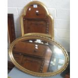 Two modern gilt framed mirrors, one of oval form with bevel plate. (2) (B.P. 21% + VAT)