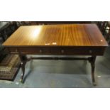 Victorian mahogany two drawer stretcher table on brass cups and casters. (B.P. 21% + VAT)
