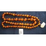A string of Baltic amber beads. (B.P. 21% + VAT)