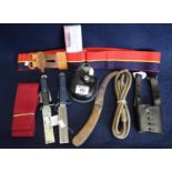 Militaria items to include; two RAF parachute line cutting knives, a coloured webbing belt, braid,