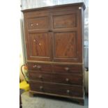 19th Century stained pine press cupboard having associate turned knob handles on bracket feet. (B.P.