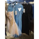 Three vintage dresses to include; a hand made pale pink party dress with tulle skirt, a blue 40's/