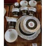 Tray of transfer printed gilded foliate and floral teaware, marked to the base 'bone china'. (B.P.