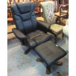 Modern Careco leather swivel armchair with matching stool. (B.P. 21% + VAT)