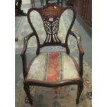 Edwardian rosewood inlaid open armchair with stuff over seat on serpentine front, standing on square