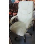 Modern cream leather office swivel armchair. (B.P. 21% + VAT)