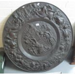 Large oxidised copper repousse plaque overall decorated with classical figures around central