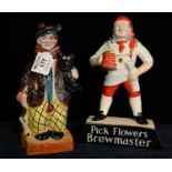 Carlton Ware 'pick flowers' brewmaster advertising figure, together with an Old Scotch and Little